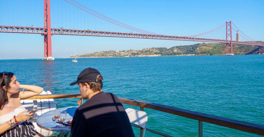 Lisbon: Tagus River Boat Tour with One Drink Included - Commerce Square and the Alfama hillside
