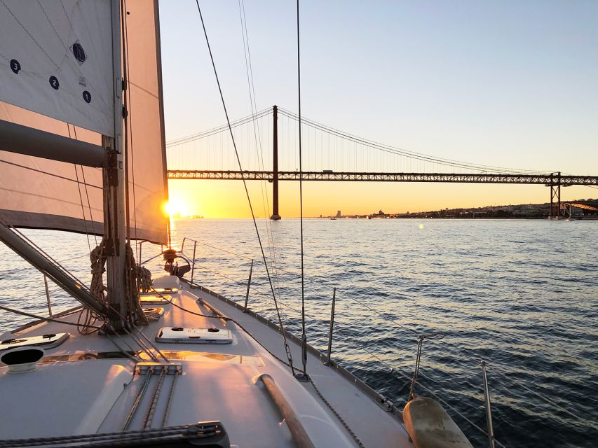 Lisbon: Tagus River Sunset Cruise with Drinks - Christ the King across the river
