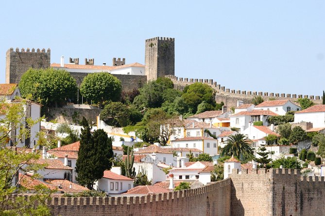 Lisbon to Porto Up To 5 Stops Óbidos Nazaré Fátima Coimbra Aveiro - Fátima: allow time for a serious visit
