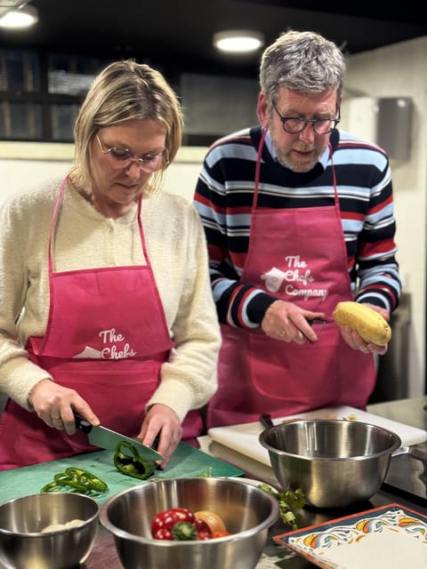 Lisbon: Traditional Portuguese Cooking Class - Starting with wine, snacks, and Portuguese conversation