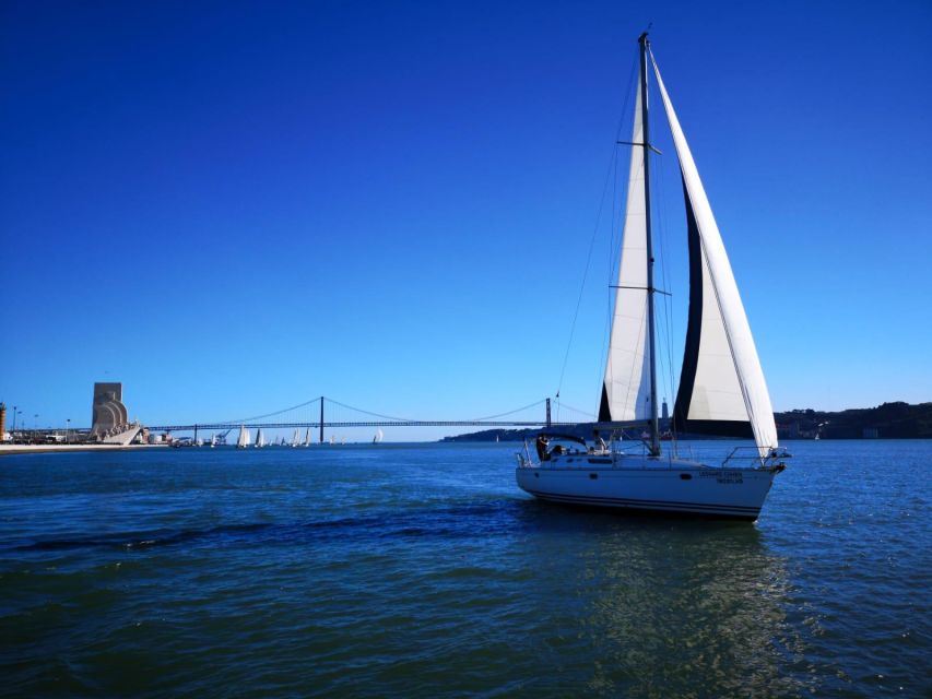 Lisbon: Yacht Sailing Tour With Portuguese Wine and History - Cristo Rei across the river