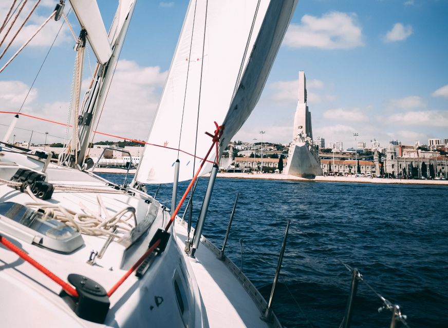 Lisbon: Yacht Sailing Tour With Portuguese Wine and History - Praça do Comércio and Baixa from the river