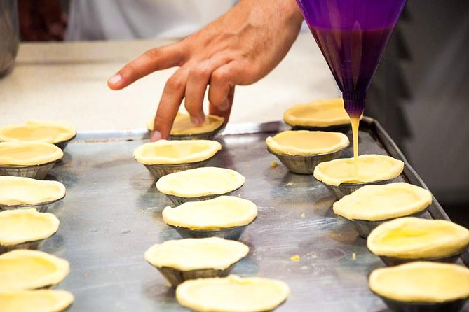 Pastel de Nata Masterclass at a Real Bakery in Downtown Lisbon - Baking in a professional oven