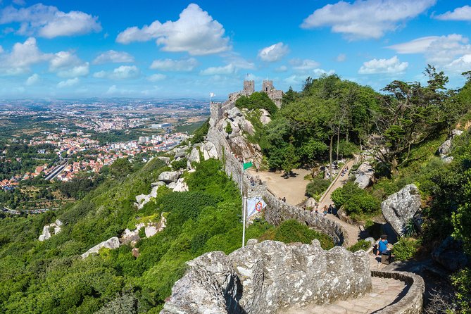 Private Half Day Tour to Sintra and Pena Palace from Lisbon - Moorish Castle and its stone mountain setting
