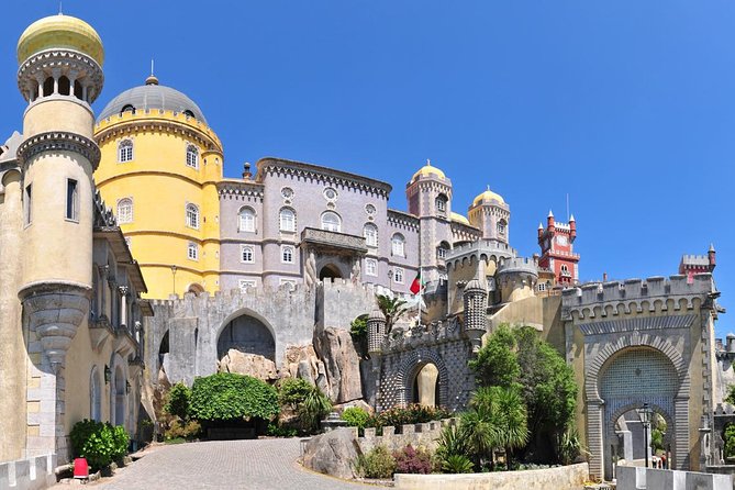 Sintra, Pena Palace, Quinta da Regaleira & Cascais Group Tour - Estoril on the return to Lisbon