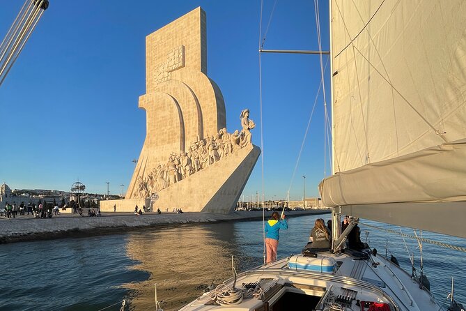 Sunset Boat Tour in Lisbon with Wine - Passing the long factory building